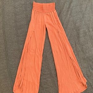 Rewash flowy pants. Size small with stretchy waist.  Orange / Terra cotta